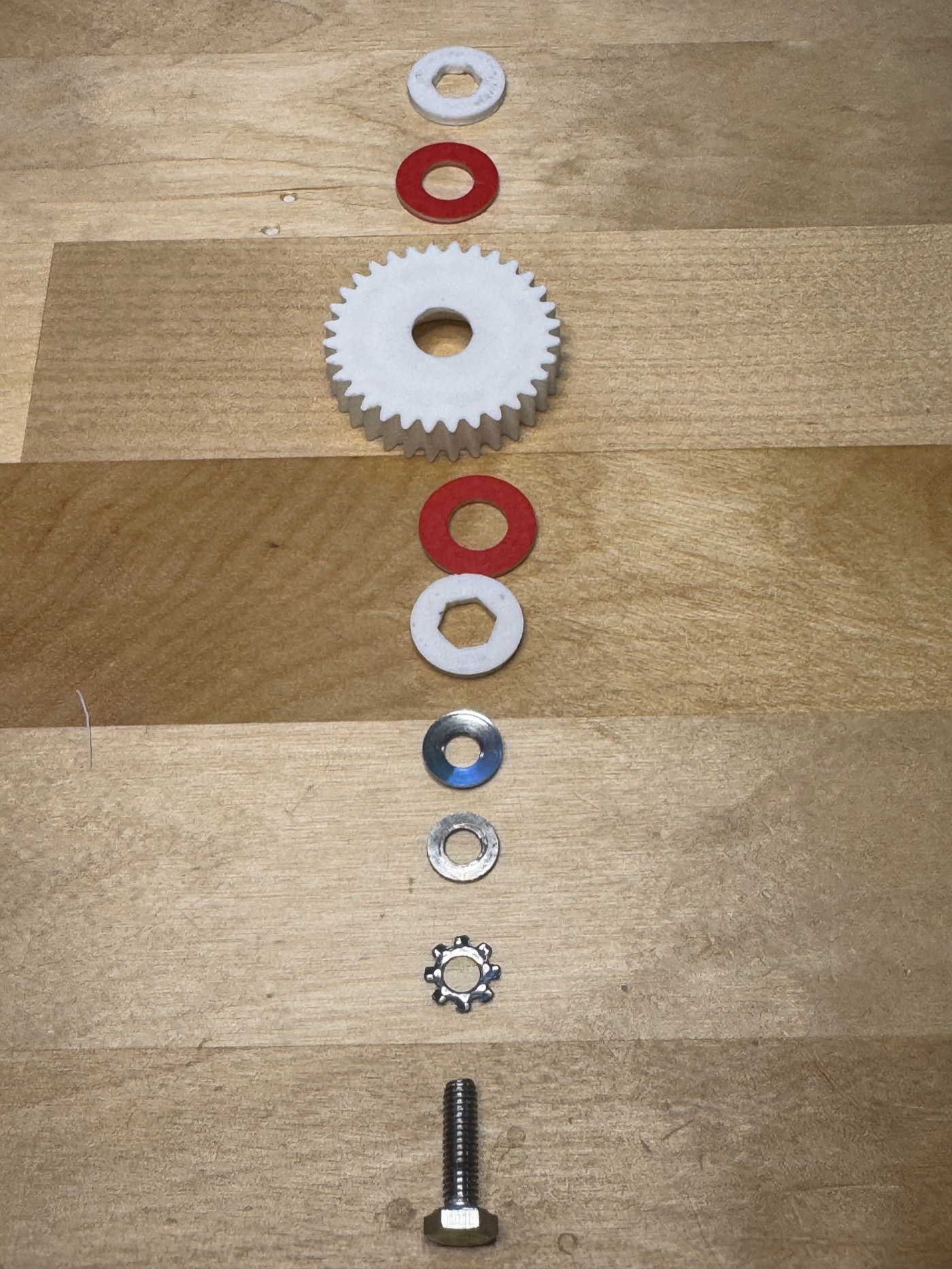 Friction clutch stack — gear, friction disc, spring washer