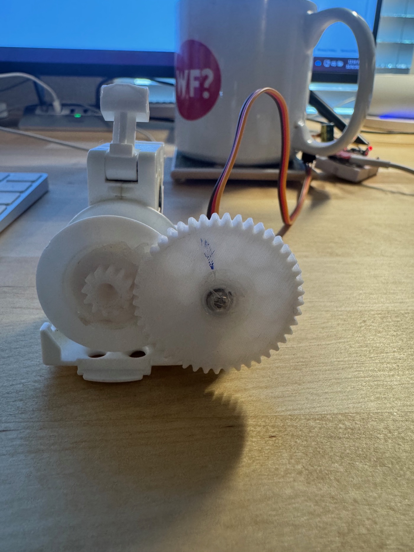 Servo-era printed gearbox on the desk, October 2025