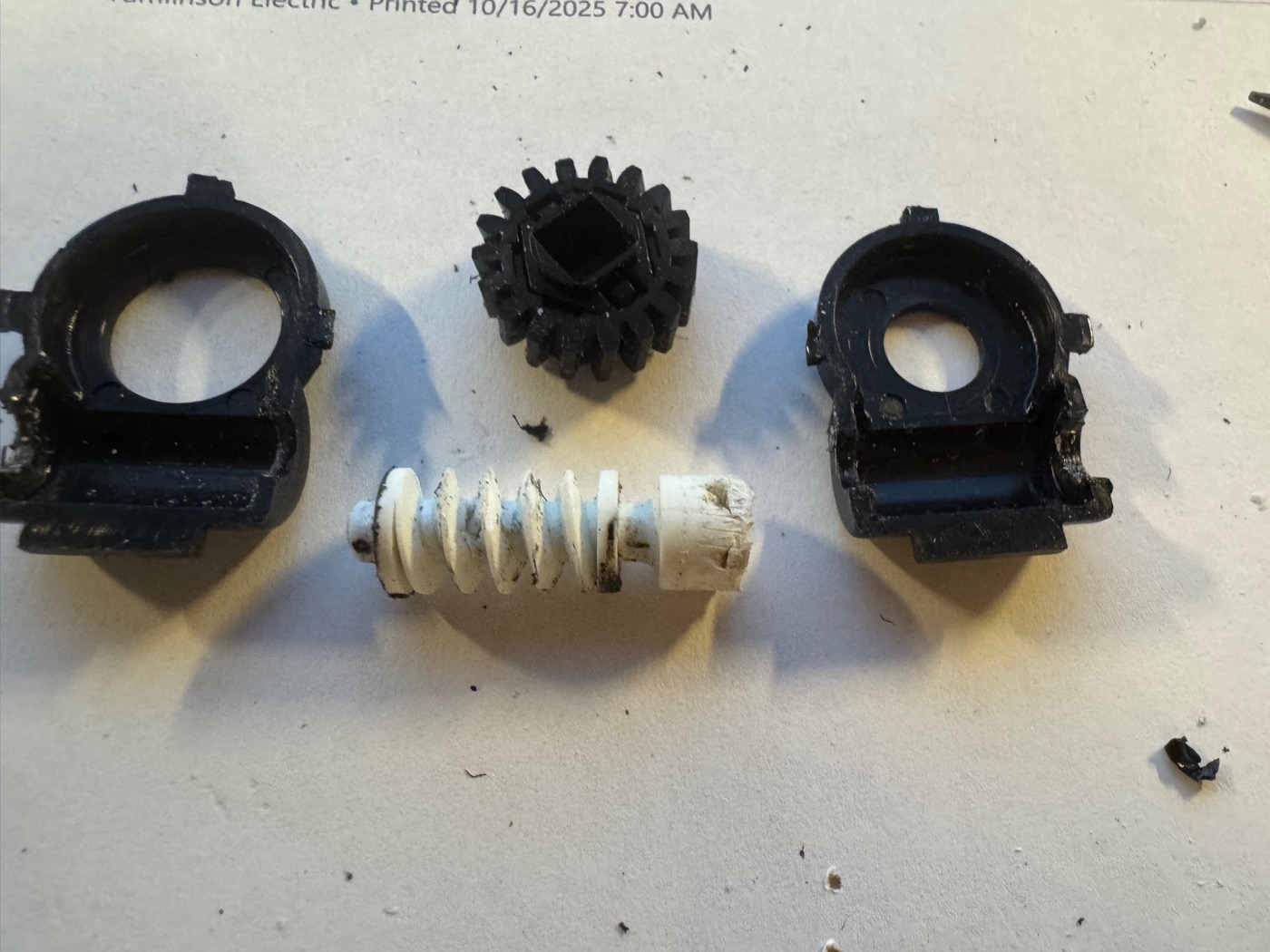 The native cord tilter disassembled on the bench